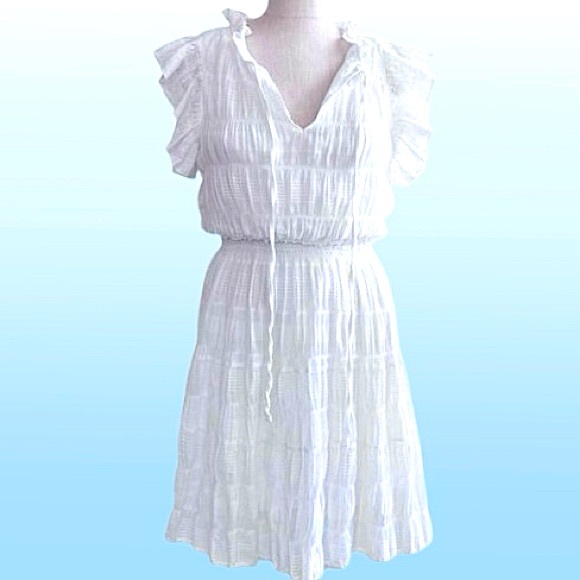 Max Studio Dresses & Skirts - Max Studio- White Gauze Dress with Ruffle Sleeve and hem.